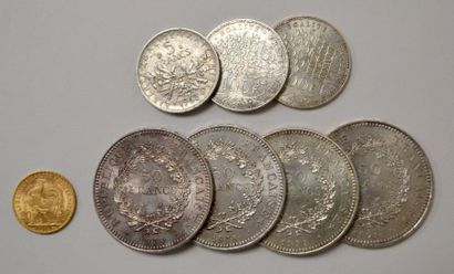 null Pièce de 20 F or 1914. On y joint un lot de pièces en argent : quatre pièces...