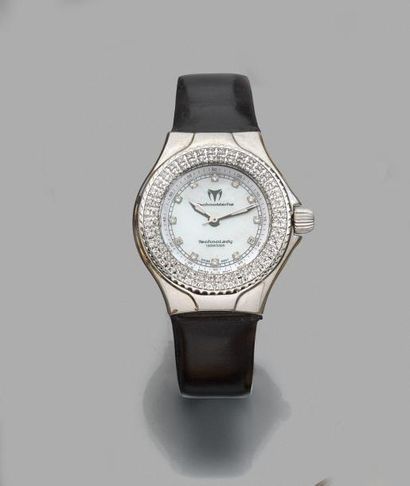 null TECHNOMARINE. MONTRE BRACELET de dame en acier, le boitier rond, la lunette...