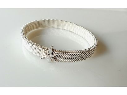 null MAUBOUSSIN. BRACELET collection "Toi non plus" en acier élastique, et CLIP en...