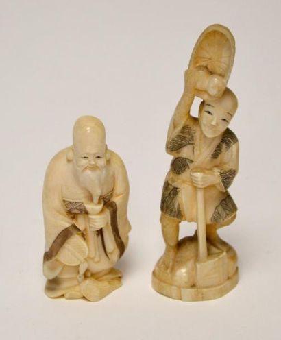 null Lot de deux SUJETS en ivoire sculpté sage barbu et bûcheron. Japon, début XXe...
