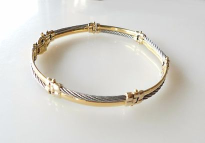 null BRACELET en or jaune et acier câble (petit choc). Poids brut 17,5 g