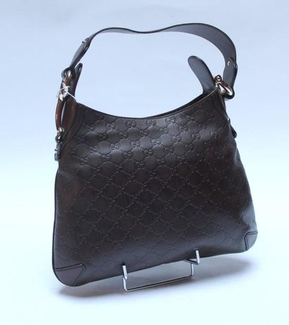 null GUCCI. SAC porté épaule en cuir monogrammé chocolat. Etat neuf.