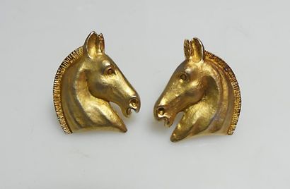 null HERMES Paris. Paire de CLIPS d'oreille en métal doré en forme de protomé de...