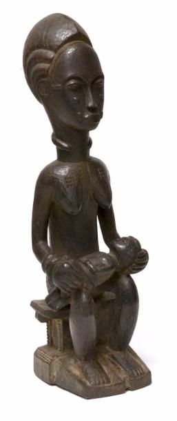 null Importante statue maternité Baoulé Anthropomorphe à patine d’usage brun foncé...
