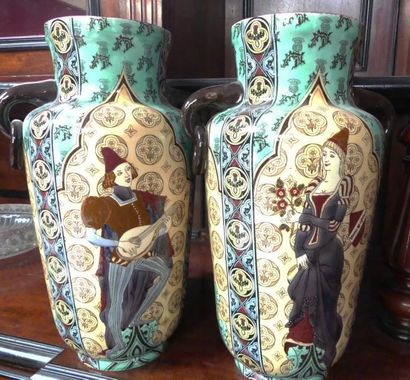 null GIEN, Paire de VASES à anses en faïence à décor polychrome d'un ménestrel et...