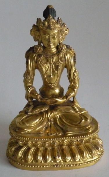 null BOUDDHA en assis en bronze doré, Tibet.