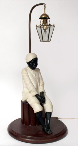 null HANIROFF, XIXe-XXe (d’après). Jeune noir américain assis. Albâtre blanc et bronze...