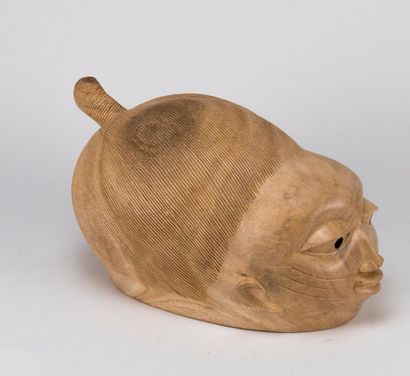 null Kifouli DOSSOU (born in 1978). Cemented mask Gélédé in carved wood, signed and...