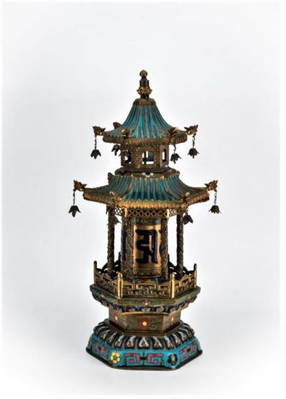 null CHINA, late 19th-early 20th century. Prayer mill in gilded copper and enamels...