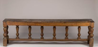 null Large walnut bench with spacer carved with baluster feet. Beautiful patina....