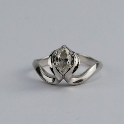 null Ring, the setting in 18K white gold and platinum, adorned with a marquise cut...