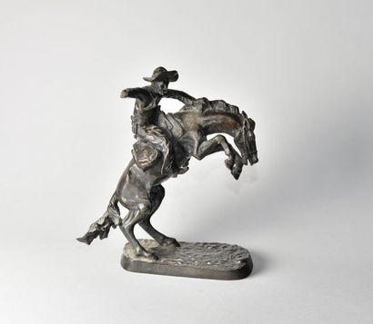 null Frédéric Remington (1861-1909) d'après. The Bronco buster. Fonte en bronze à...