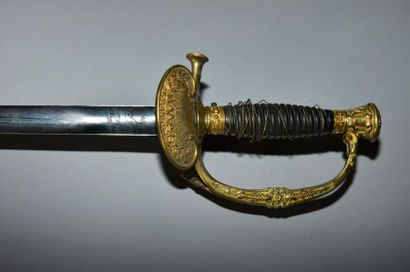 null Epée d’officier de la garde impériale modèle 1860.
Fusée avec filigrane (accident).
Monture...