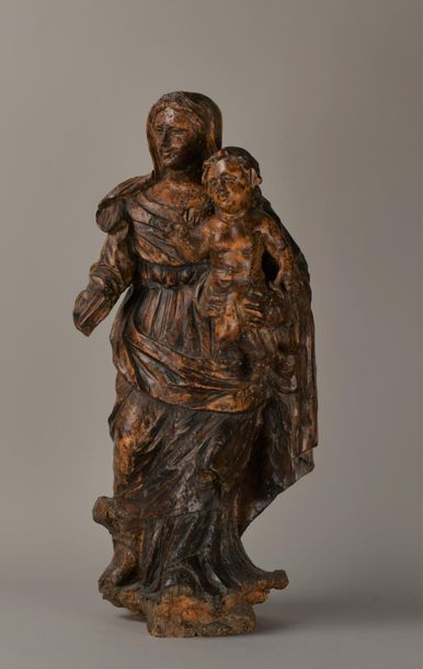 null Ecole du XVIIIème siècle. Vierge à l'enfant. Sujet en bois sculpté. H :77 cm....