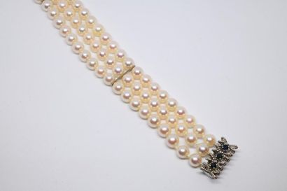 Bracelet manchette trois rangs de perles...