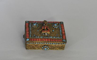 null Tibet, early 20th century. 
Reliquary covered in copper and inlaid with hard...