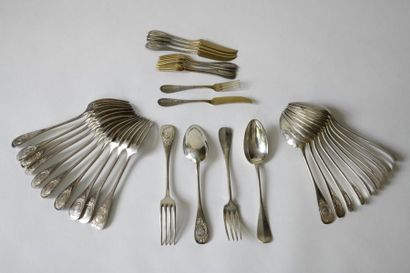 null A suite of twelve plain silver cutlery pieces, the spatulas decorated with a...