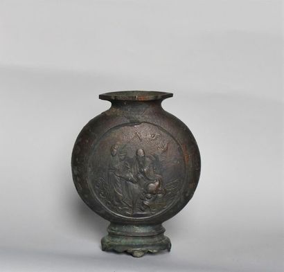 null China, 19th century. Globular bronze vase, resting on a foot, decorated with...