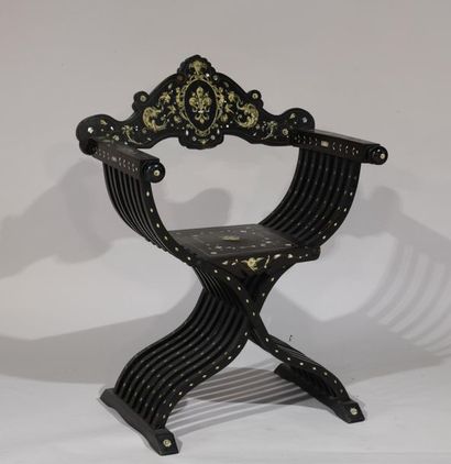 null Italy 19th century. Curl armchair in blackened wood with ivory and blackened...