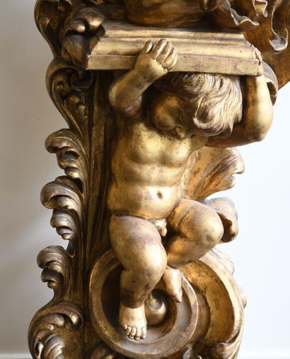 null *French school of the 18th century. 
Torch-bearing angel, in a palmette setting....