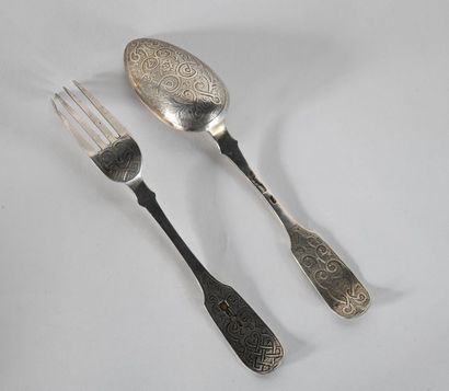 null Russia. Covered in silver with spatulas and spoons engraved with floral scrolls...