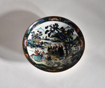 null Porcelain dish decorated with Chinese characters in a landscape
Japan, Kutani,...