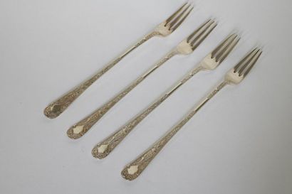 null Four silver plated metal forks with engraved decoration. Foreign work (Germany?)....