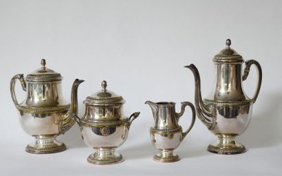 null Charles JULIEN (19th-20th). Four-piece silver and partially gilded metal service,...