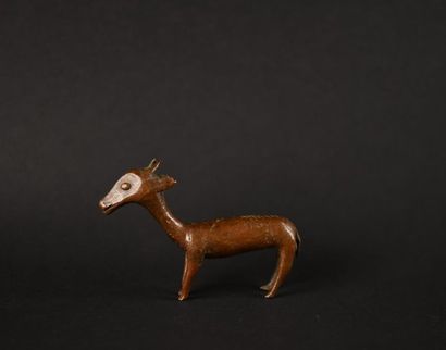 null Côte d'Ivoire. Gazelle.
Sujet en bronze à patine brune. 
H : 6,5 cm
Provenance...