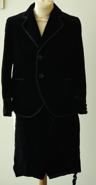null Two sets of black velvet boy's jackets and short pants.
4-5 years and 8 years...