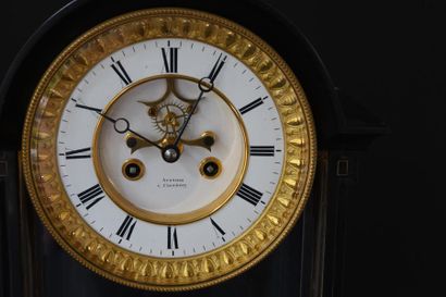 null Pendulum clock in black marble, the enamelled dial with brass surround. Mercury...