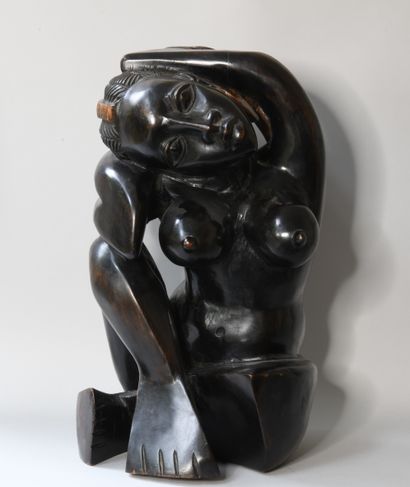 null Afrique XXe siècle

Femme assise contorsionnée

Sculpture en bois patiné noir.

H...