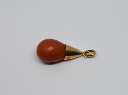 null Antique fully faceted natural red coral pendant, the setting in yellow gold...