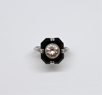 null An Art Deco ring with a center of approximately 1.30 carats of old cut diamonds...