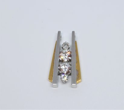 null 
An Art Deco style pendant set with a rail of four old-cut diamonds, the yellow...