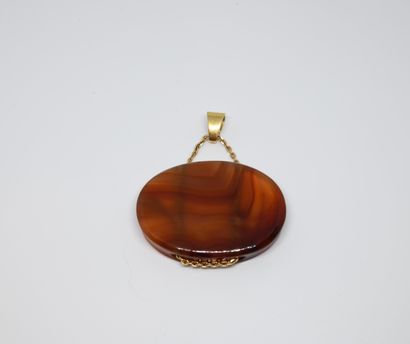 null Orange ribbon agate pendant, the setting in yellow gold 750 ‰ 

Owl hallmark

Gross...