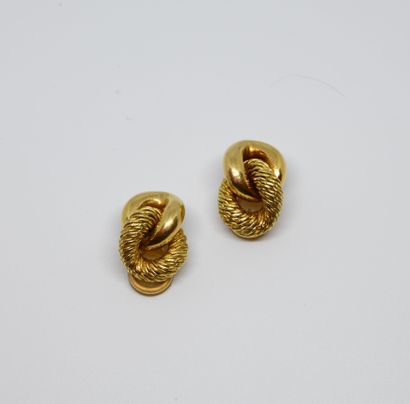 null Pair of ear clips (for non-pierced ears) with two links, one of which compressed...