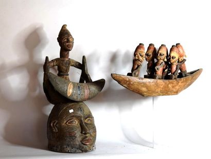null NIGERIA 

 Masque de style GUELEDE et barque de Style YORUBA en bois sculpté...