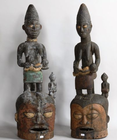 null NIGERIA 

Deux masques EPA en bois sculpté polychrome

XXe, de style YORUBA...