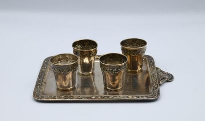 null Liqueur service, the four silver glasses and the silver plated metal tray with...