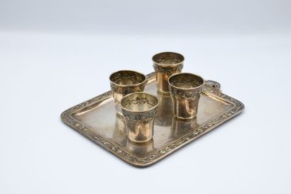 null Liqueur service, the four silver glasses and the silver plated metal tray with...