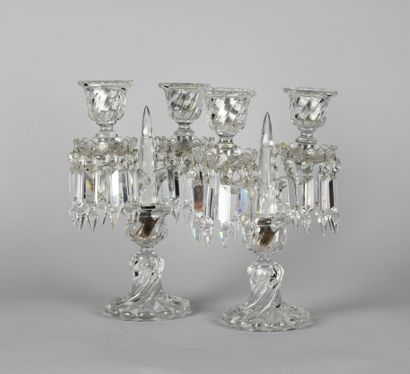 null BACCARAT, France. 

Paire de girandoles en cristal taillé à deux bras de lumières,...