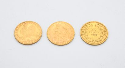null *Trois pièces en or :
- 20 F Napoléon III de 1860
- 20 FF de 1907 et 1910