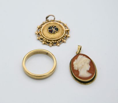 Set of two medallions and a wedding ring...