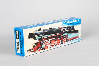 null MARKLIN.
23014 steam locomotive with tender, red and black, HO.
Reference 3005.
Very...