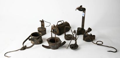 null Reunion of seven miner's lamps, including one ras au coq.
H: 24.4 cm for the...