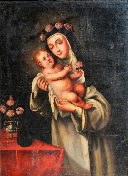 null Ecole Française du XVIIème siècle. Sainte carmelite tenant l'Enfant Jésus qui...