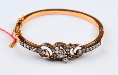 Bracelet rigide en or et argent à joli motif...