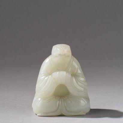 null CHINE, XVIIIe / XIXe siècle. Statuette en jade céladon pâle sculpté, représentant...