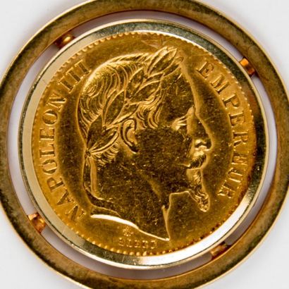 null Pièce 20 francs or, Napoléon III A 1865 et porte-pièce alliage d'or 585 millièmes.
Poids...